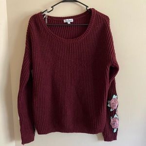Burgundy Sweater with roses on the sleeve